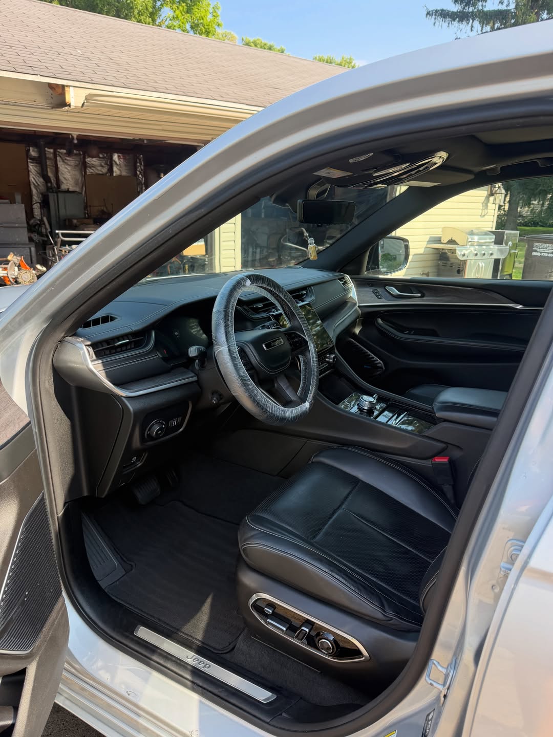 Jeep interior with detailed dashboard and steering wheel